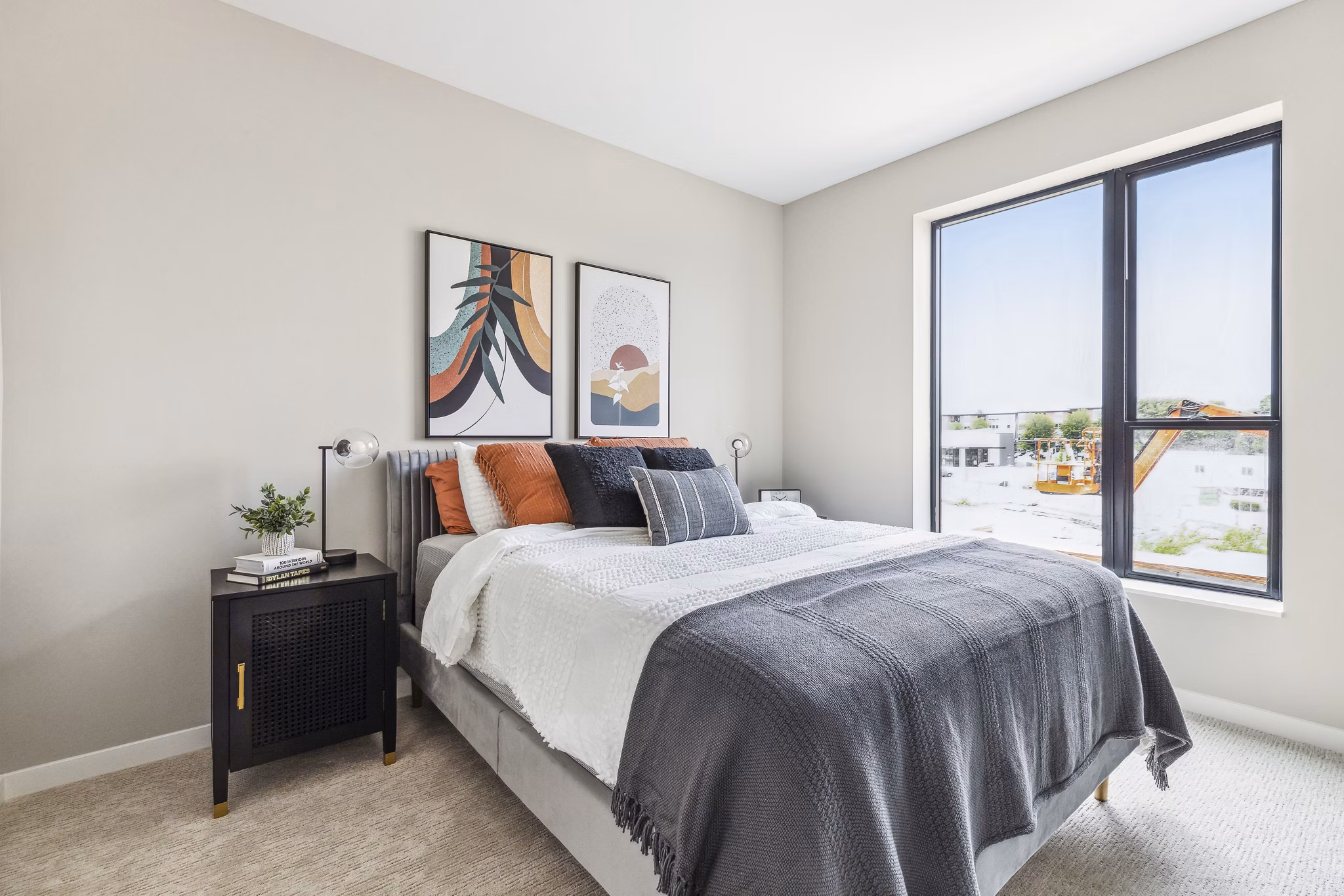 Modern bedroom with elegant decor at The Eddi Apartments
