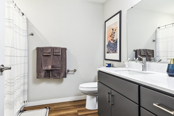 Modern bathroom with sleek fixtures in The Eddi Apartments