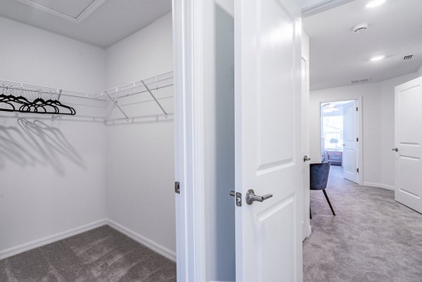 Modern bedroom featuring elegant design elements in Balcara 301 at Sun City Apartments
