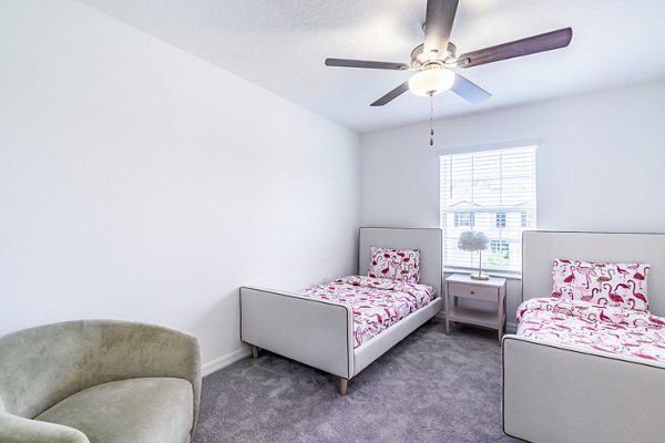 Spacious bedroom featuring modern decor at Balcara 301 in Sun City Apartments