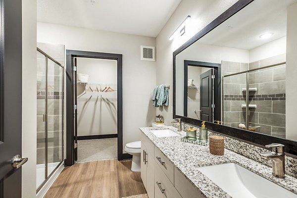 Modern bathroom with elegant fixtures in Presidium Regal Apartments