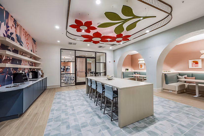Clubhouse featuring modern design and open seating areas at Presidium Regal Apartments