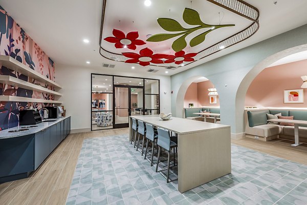 Clubhouse featuring modern design and open seating areas at Presidium Regal Apartments