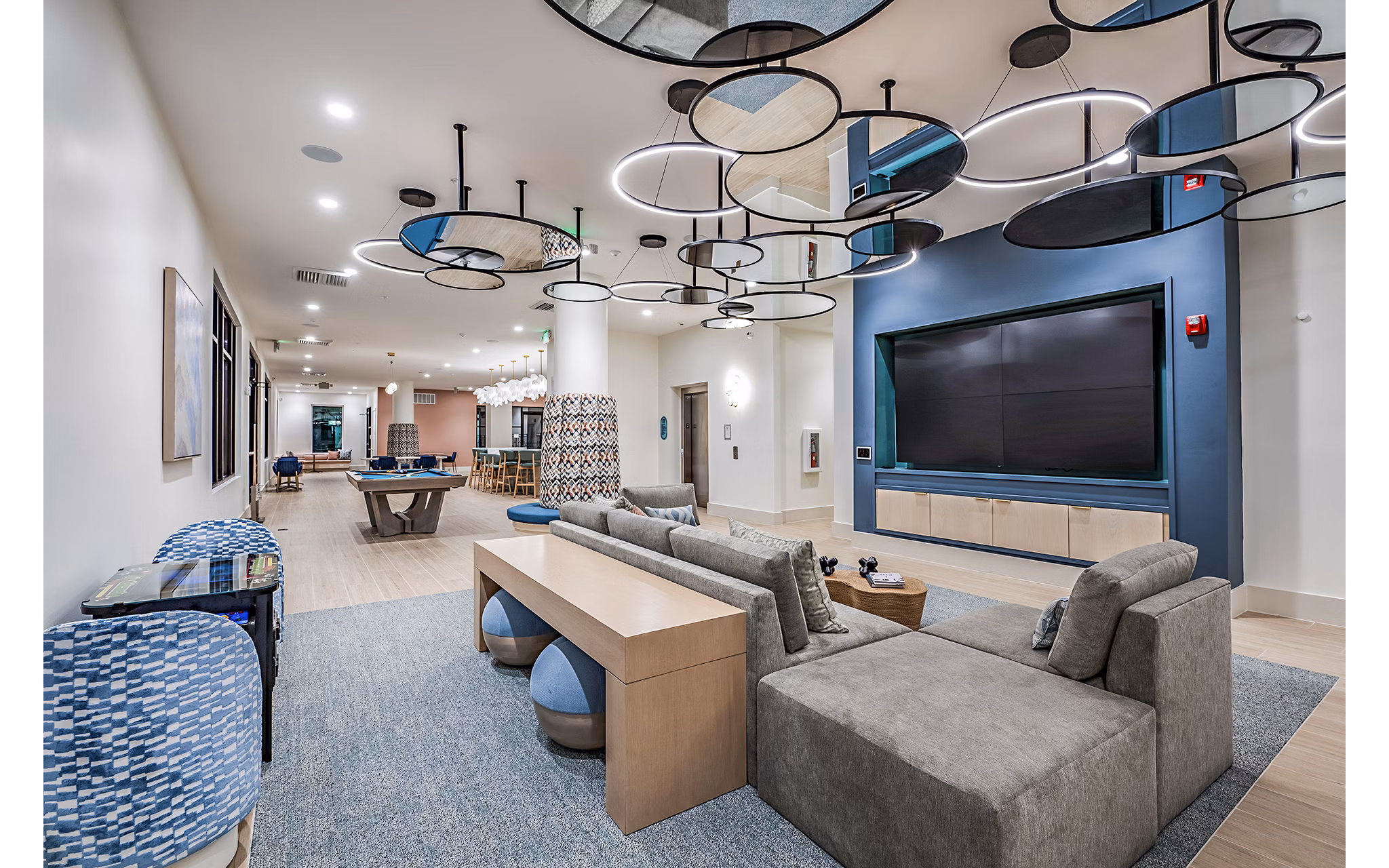 Clubhouse theater with plush seating and large screen at Presidium Regal Apartments, perfect for entertainment and relaxation