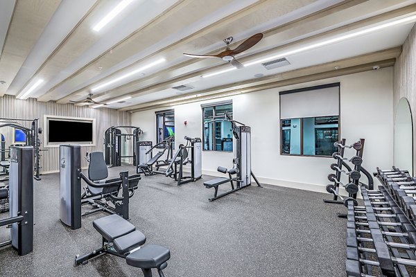 Fitness center with modern equipment at Presidium Regal Apartments