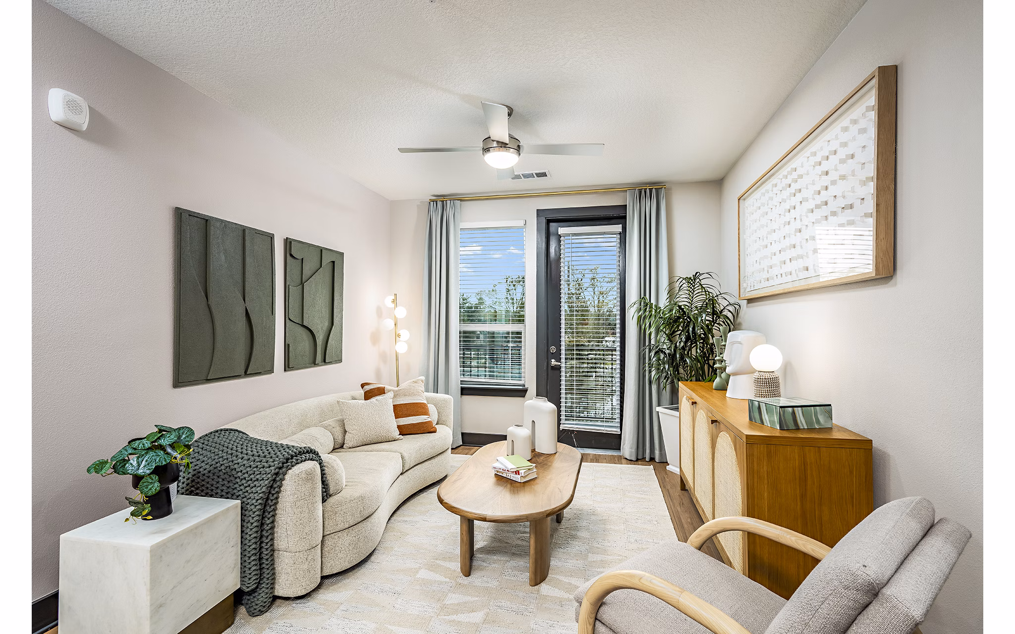 Spacious living room with modern decor in Presidium Regal Apartments, ideal for luxury living