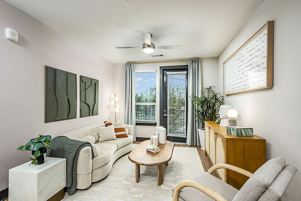 Spacious living room with modern decor in Presidium Regal Apartments, ideal for luxury living