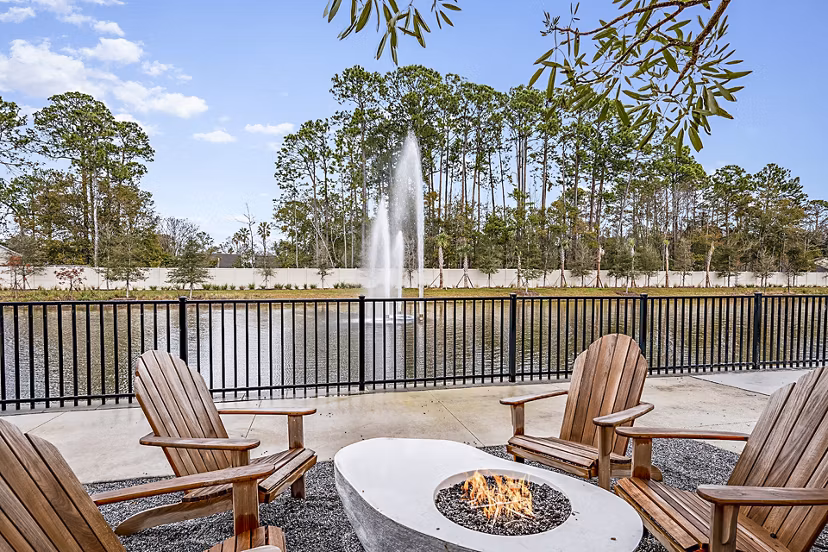 Fire pit on a modern patio at Presidium Regal Apartments, a luxury living destination