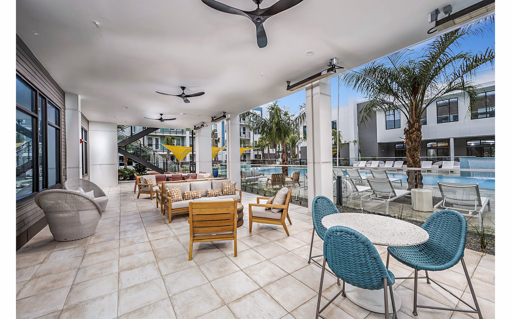 Fire pit on patio at Presidium Regal Apartments, a luxury feature for outdoor relaxation