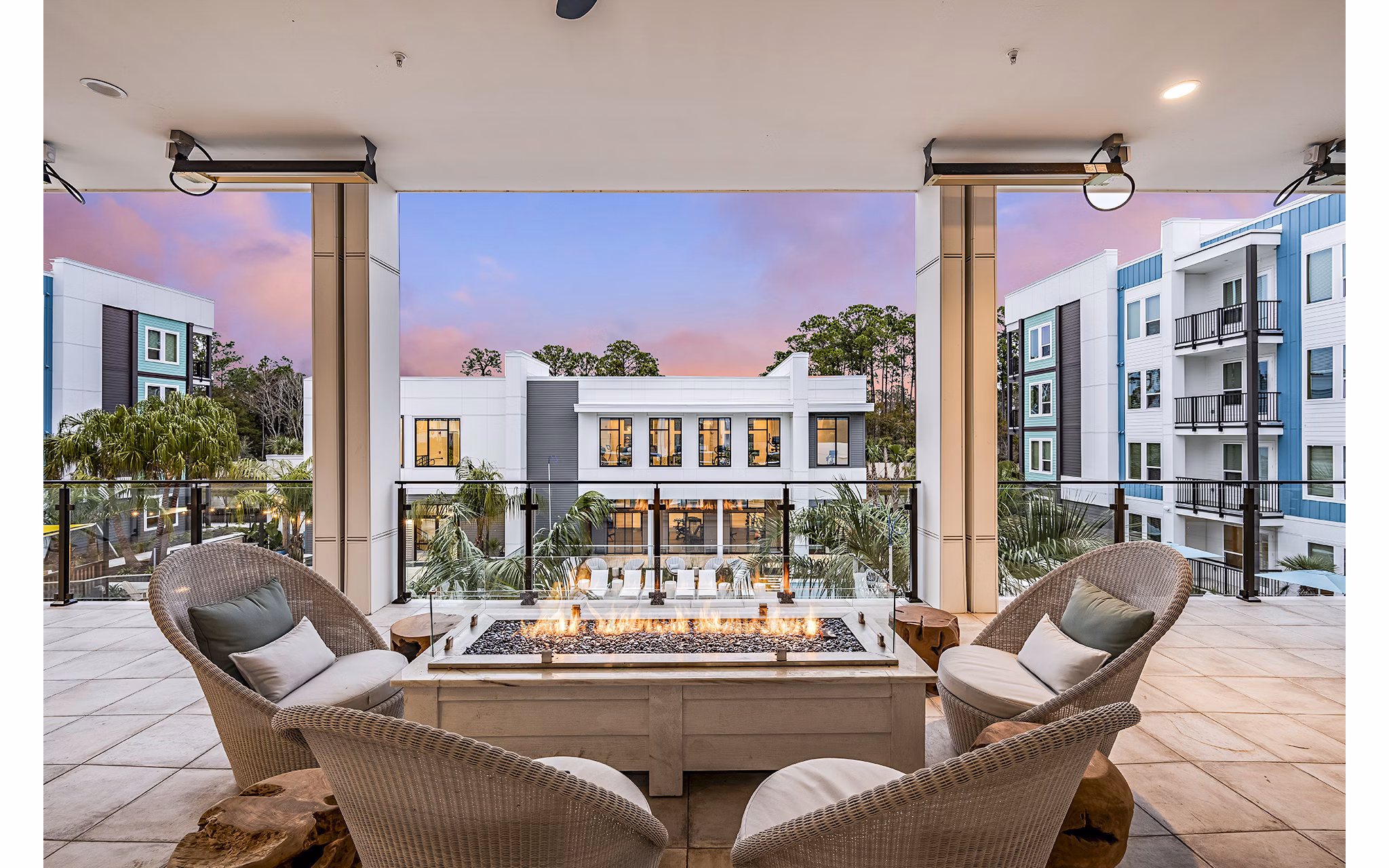 Inviting outdoor fire pit and patio at Presidium Regal Apartments, perfect for social gatherings and relaxation