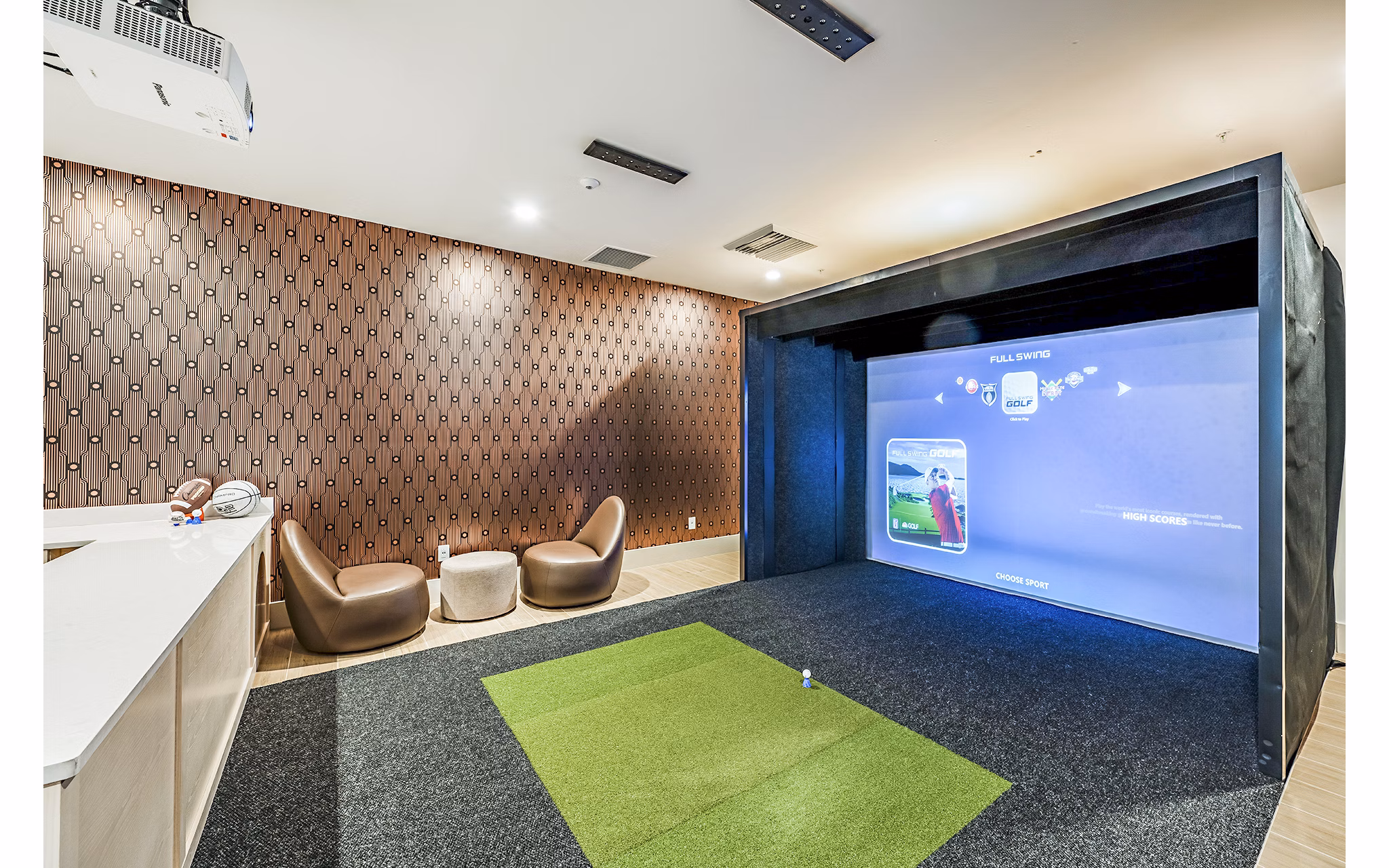 Virtual driving range at Presidium Regal Apartments offers state-of-the-art golf simulation technology for residents to practice and enhance their swing