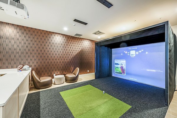 Virtual driving range at Presidium Regal Apartments offers state-of-the-art golf simulation technology for residents to practice and enhance their swing