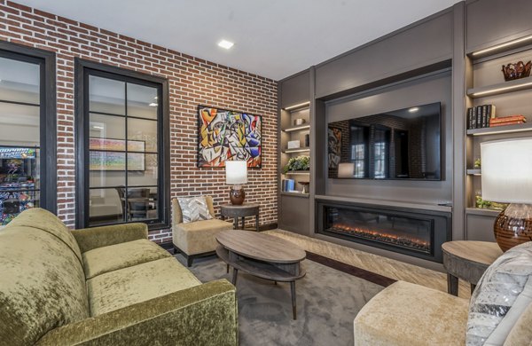 Clubhouse interior featuring modern seating and meeting spaces at The Westlyn Apartments