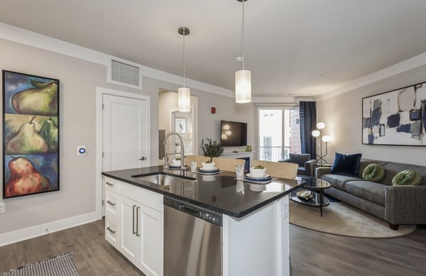 Modern kitchen with stainless steel appliances at The Westlyn Apartments