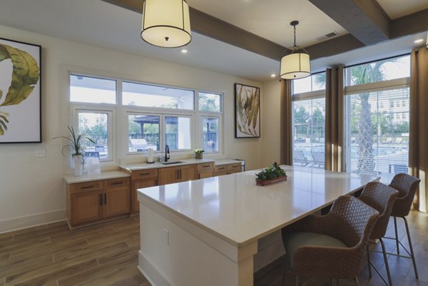 Stylish clubhouse with modern seating at Riverwood Apartments, ideal for community gatherings and events