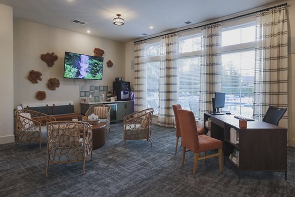 Clubhouse featuring elegant interiors and modern amenities at Riverwood Apartments, a luxury living experience by Greystar