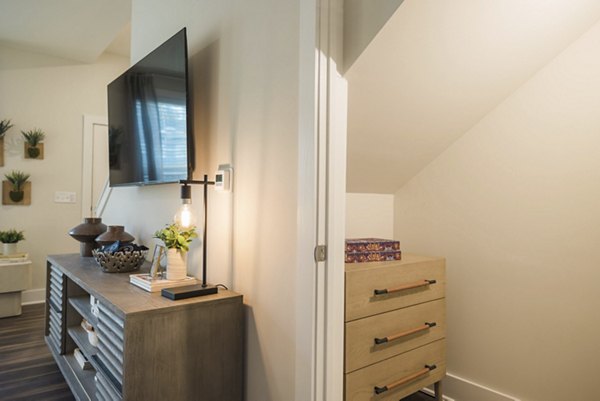 Spacious modern kitchen with stainless steel appliances in Riverwood Apartments