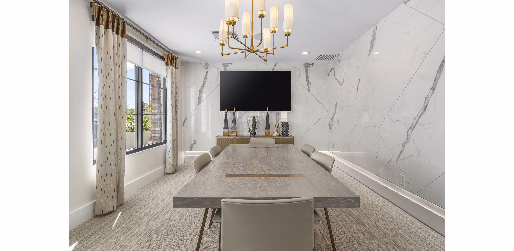 Modern meeting facility at The Griffin Apartments with state-of-the-art audiovisual equipment for residents' convenience