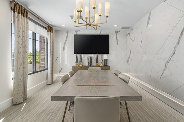Modern meeting facility at The Griffin Apartments with state-of-the-art audiovisual equipment for residents' convenience