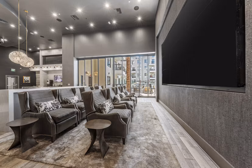 Theater featuring plush seating and advanced sound system at The Griffin Apartments