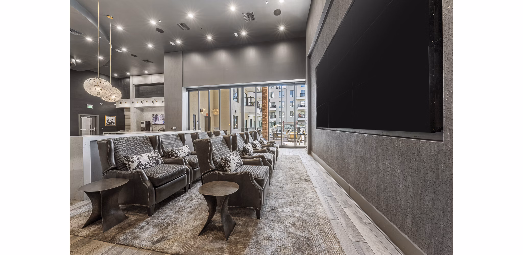 Theater featuring plush seating and advanced sound system at The Griffin Apartments