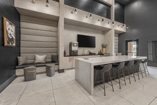 Stylish clubhouse with modern decor at The Griffin Apartments, offering luxury amenities for residents