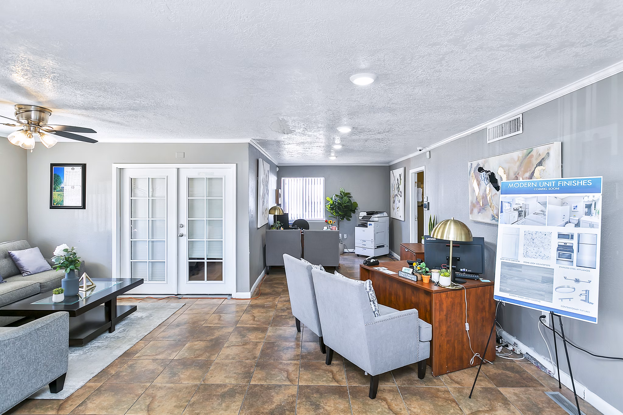 Clubhouse and leasing office with modern decor at Tesota Four Hills Apartments
