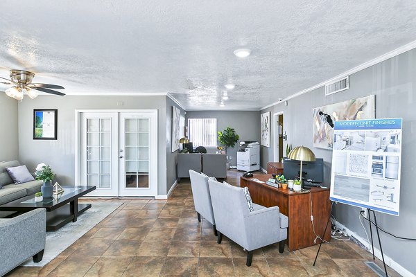 Clubhouse and leasing office with modern decor at Tesota Four Hills Apartments