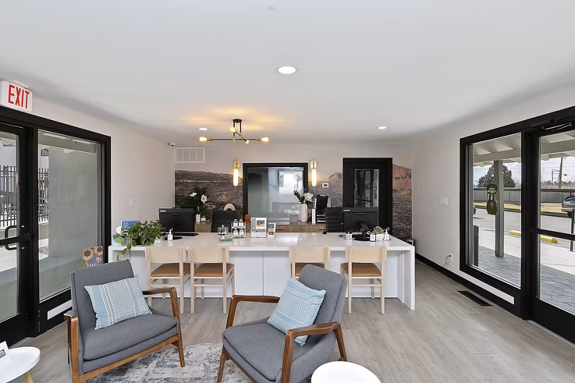 Modern clubhouse with sleek furnishings and community space at Tesota Midtown Apartments