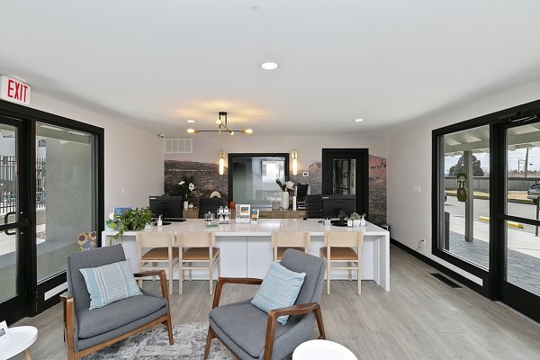 Modern clubhouse with sleek furnishings and community space at Tesota Midtown Apartments