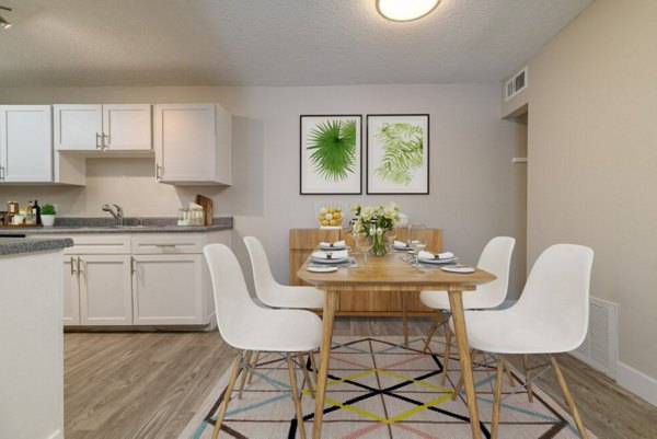 Elegant dining area with modern decor at Tesota Midtown Apartments