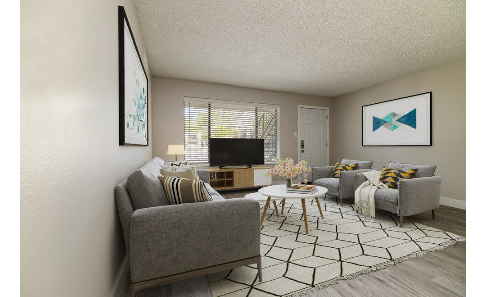 Spacious living room with sleek modern decor at Prado Apartments luxury community