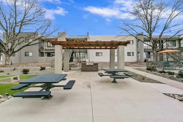 Tesota Midtown: Modern courtyard with lush landscaping and seating areas at luxury apartments