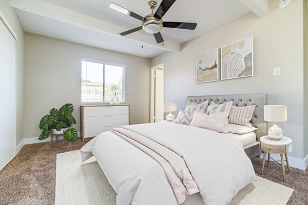 Spacious bedroom with modern decor at Tesota Morningside Apartments in a luxury setting