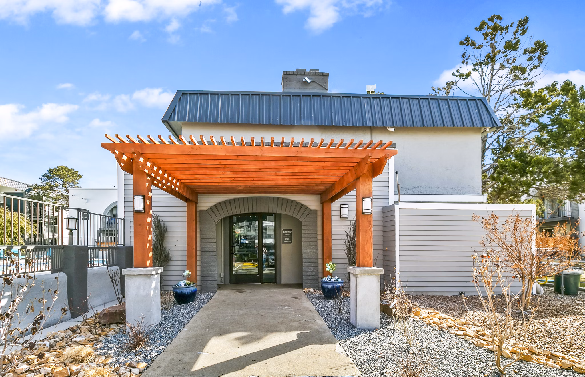Community clubhouse at Tesota Morningside Apartments featuring a modern design and comfortable seating for social gatherings