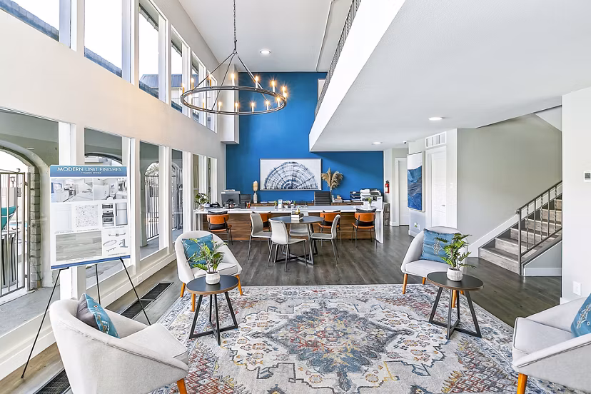 Clubhouse with modern design and seating areas at Tesota Morningside Apartments
