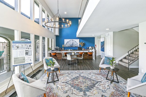 Clubhouse with modern design and seating areas at Tesota Morningside Apartments
