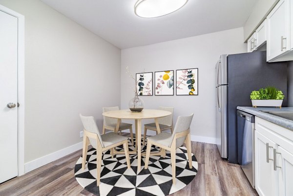 Dining room with modern decor and elegant lighting at Tesota Morningside Apartments