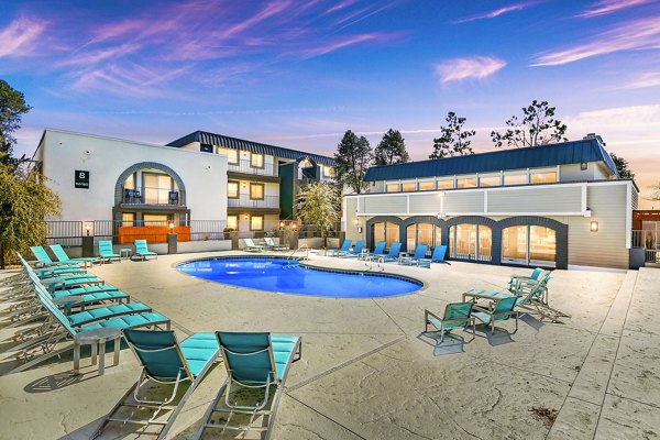 Resort-style outdoor pool at Tesota Morningside Apartments offers luxury relaxation amidst lush landscapes