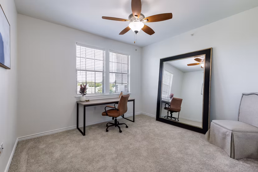 Cozy bedroom featuring modern decor at Aviva Fort Worth Apartments