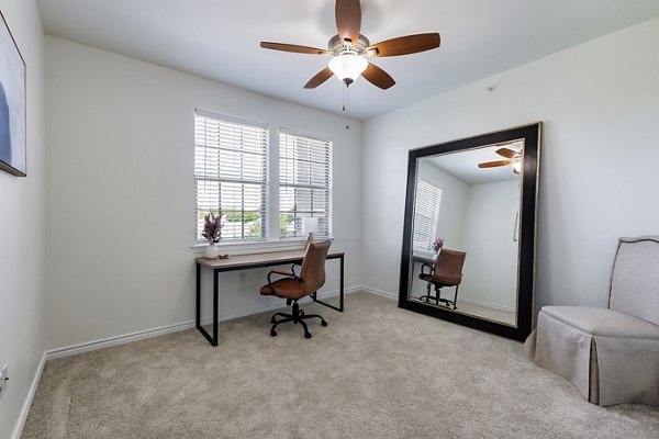 Cozy bedroom featuring modern decor at Aviva Fort Worth Apartments