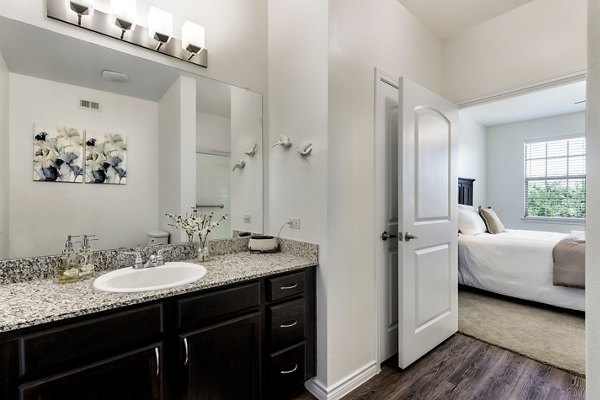 Sleek modern bathroom with elegant fixtures at Aviva Fort Worth Apartments