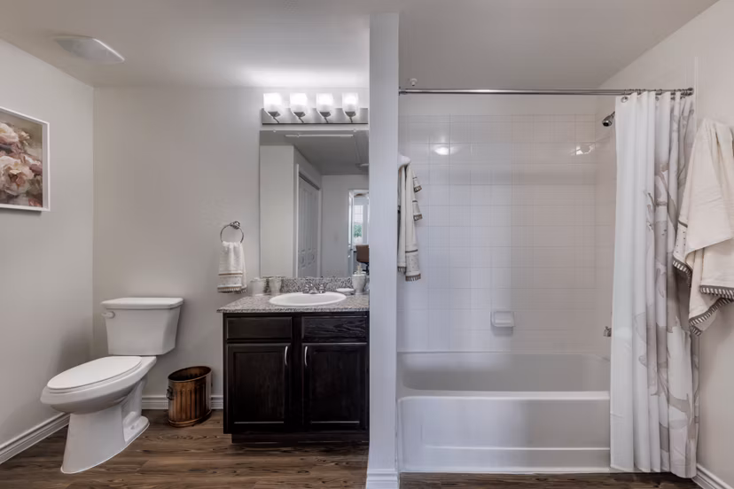 Bathroom with sleek design and modern fixtures at Aviva Fort Worth Apartments, a luxury living community offering elegance and comfort