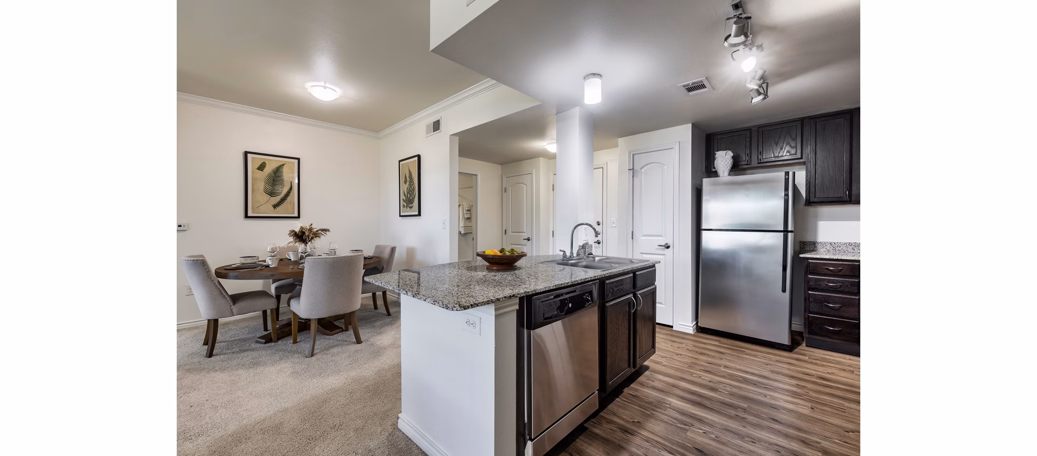 Modern kitchen with stainless steel appliances at Aviva Fort Worth Apartments
