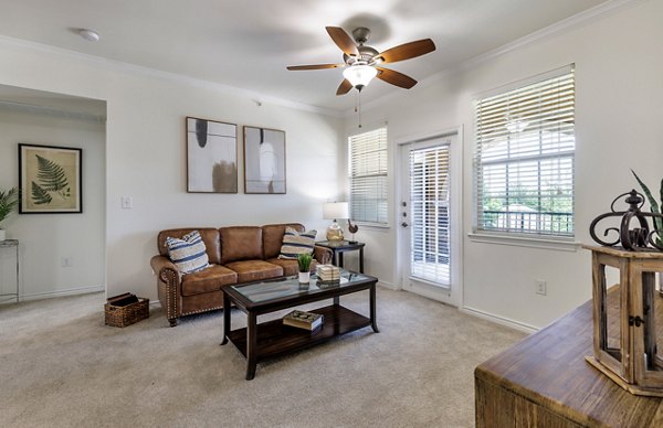 Spacious living room with modern furnishings in Aviva Fort Worth Apartments