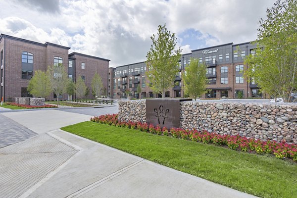 Filament Apartments: Sleek modern of luxury high-rise in bustling downtown neighborhood