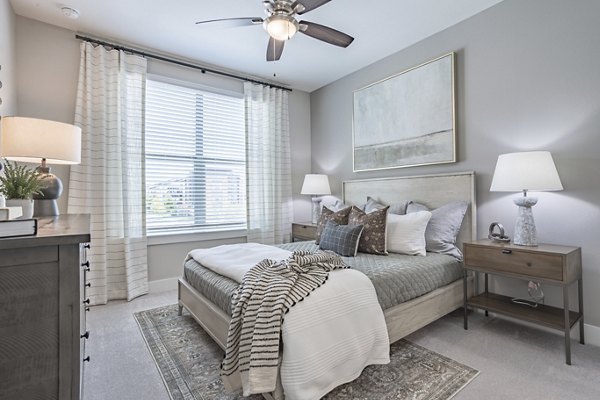 Cozy bedroom with modern decor at Filament Apartments