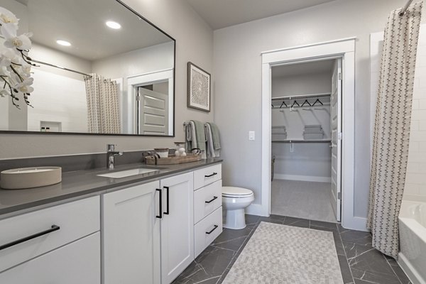 Bathroom featuring modern fixtures at Filament Apartments, a luxury living community
