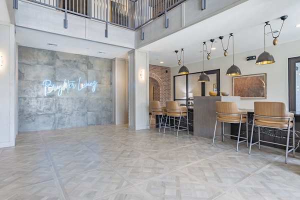 Clubhouse at Filament Apartments: Elegant clubhouse featuring modern design and plush seating for resident gatherings and events