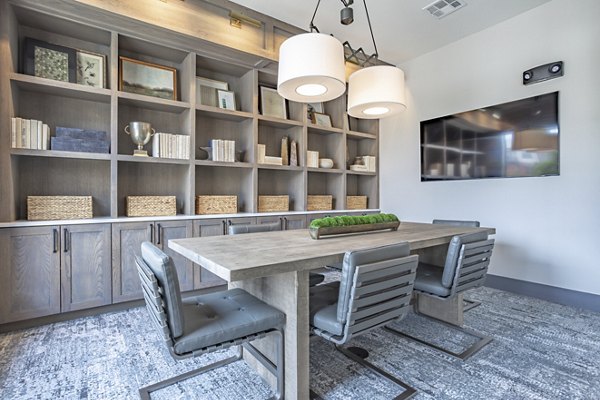 Modern meeting facility with high-tech amenities at Filament Apartments, perfect for business gatherings and collaborative sessions